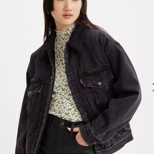 Ladies Levi’s black 90’s Trucker Black Denim Jacket